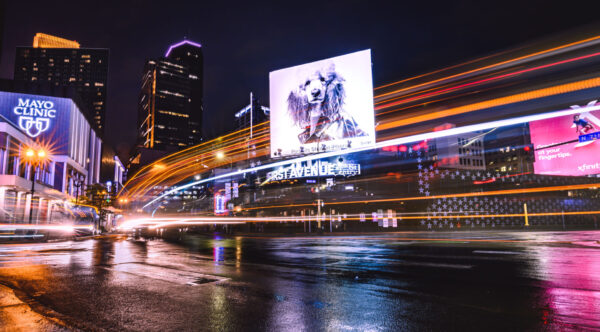 Traffic Buzzing by First Ave. Late Night
